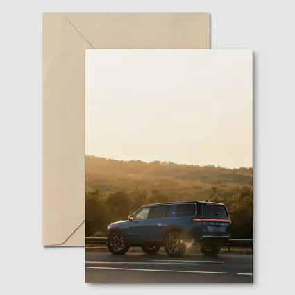 Rivian R1S SUV Golden Hour Road