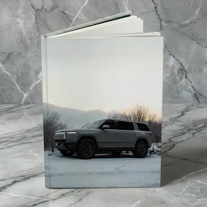 Rivian R1S SUV Parked in Winter Snow