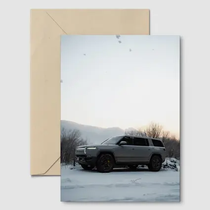 Rivian R1S SUV Parked in Winter Snow