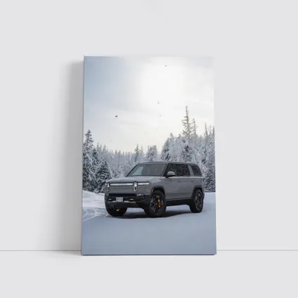Rivian R1S SUV Snowy Winter Forest