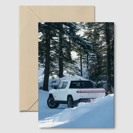 Rivian R1S White Truck Snowy Forest