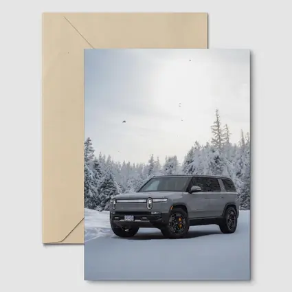 Rivian R1S SUV Snowy Winter Forest