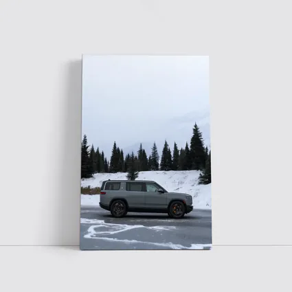 Rivian R1S Gray SUV Snowy Mountain Forest
