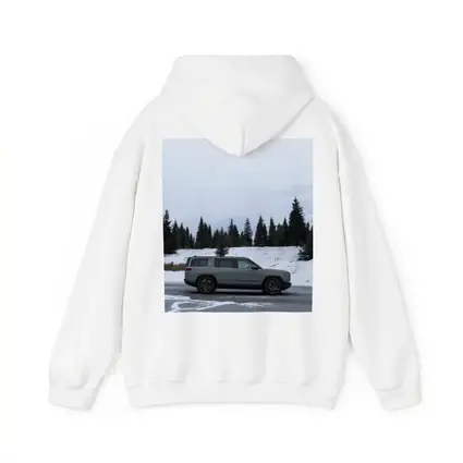 Rivian R1S Gray SUV Snowy Mountain Forest