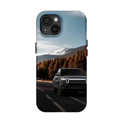 Rivian R1S on Mountain Road Forest Background
