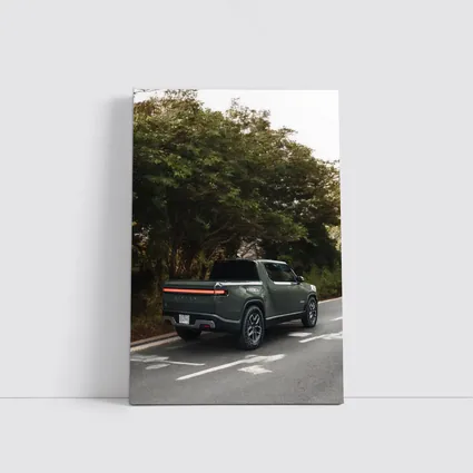Rivian R1T Truck on Forest Road
