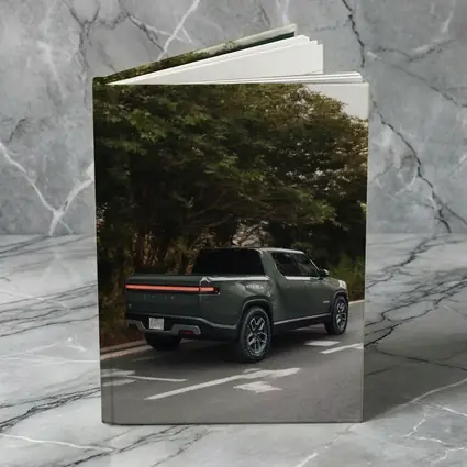 Rivian R1T Truck on Forest Road