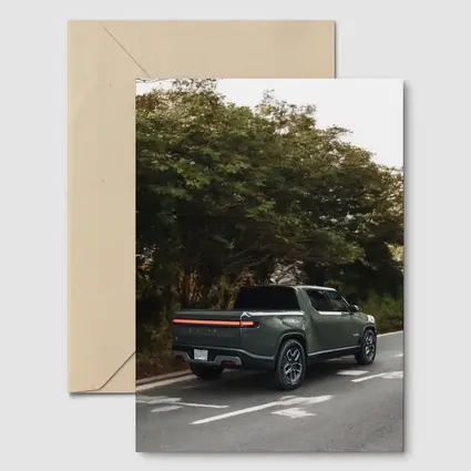 Rivian R1T Truck on Forest Road
