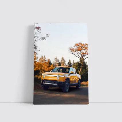 Rivian R1T Electric Truck Autumn Forest Setting