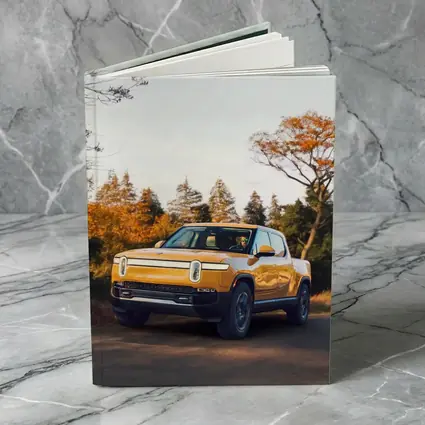 Rivian R1T Electric Truck Autumn Forest Setting