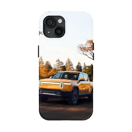 Rivian R1T Electric Truck Autumn Forest Setting