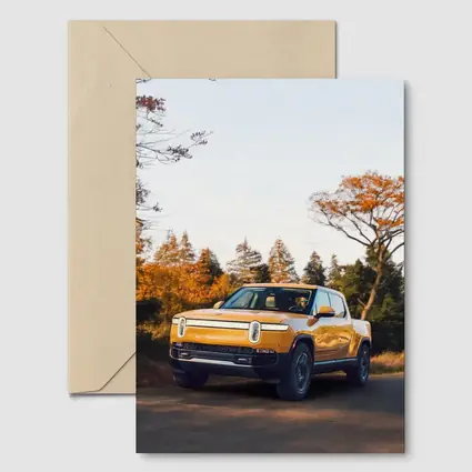 Rivian R1T Electric Truck Autumn Forest Setting