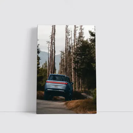 Rivian R1S SUV Winding Forest Mountain Road