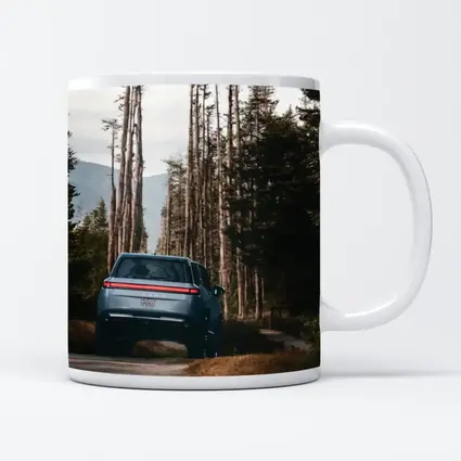 Rivian R1S SUV Winding Forest Mountain Road