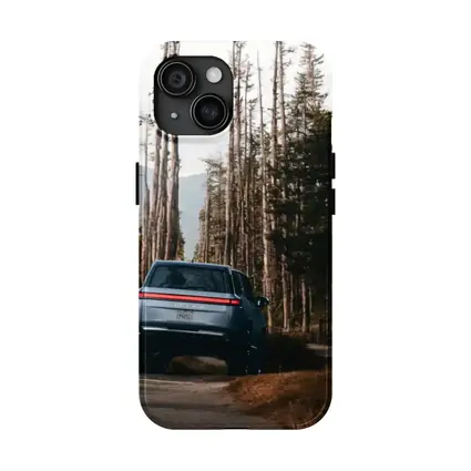 Rivian R1S SUV Winding Forest Mountain Road