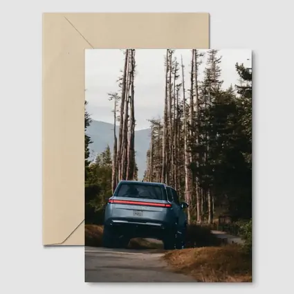 Rivian R1S SUV Winding Forest Mountain Road