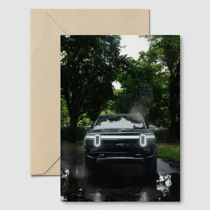 Rivian R1T Truck Rainy Forest Road