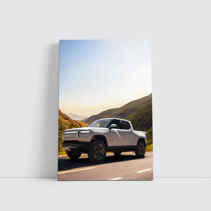 Rivian R1T Electric Truck Mountain Highway Sunrise