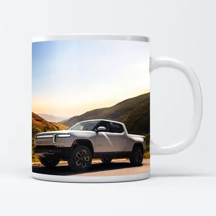 Rivian R1T Electric Truck Mountain Highway Sunrise