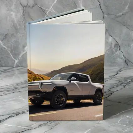 Rivian R1T Electric Truck Mountain Highway Sunrise
