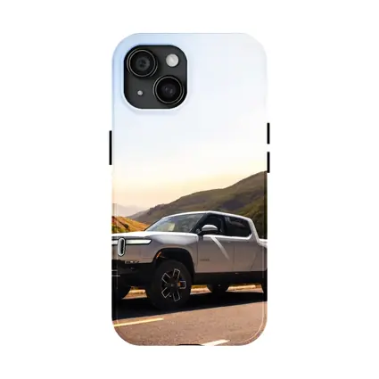 Rivian R1T Electric Truck Mountain Highway Sunrise