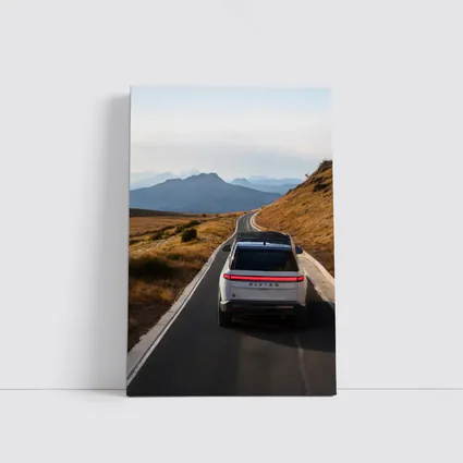 Rivian R1S On Mountain Road At Dusk