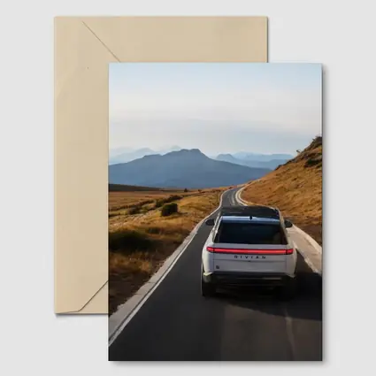 Rivian R1S On Mountain Road At Dusk