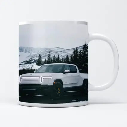 Rivian R1T White Truck Snowy Mountain Road