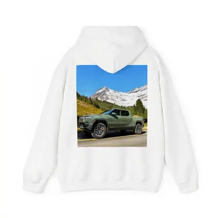 Rivian R1T Green Truck Snowy Mountain Road