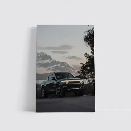 Rivian R1T Black Truck Winter Mountain Dusk
