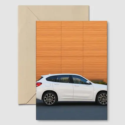 BMW X1 White Side View Orange Wall