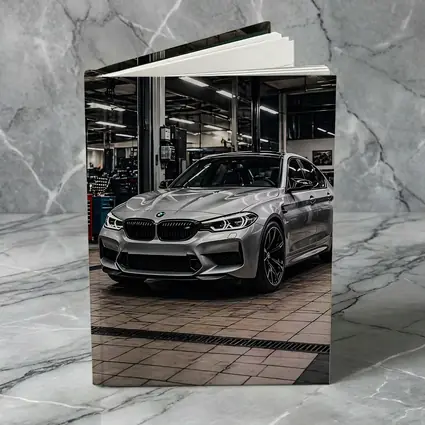 Silver BMW M5 Inside Auto Service Bay