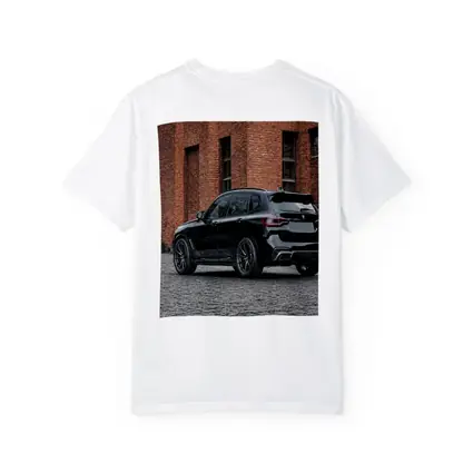Black BMW X5M Parked Near Brick Building