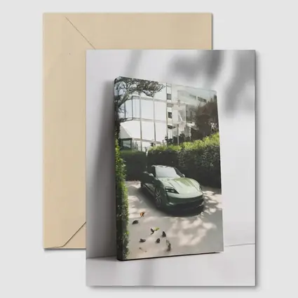 Green Porsche Taycan Parked By Glass Building