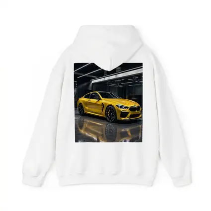 Yellow BMW M8 Parked in Dark Garage