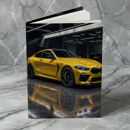 Yellow BMW M8 Parked in Dark Garage