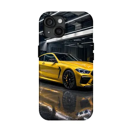 Yellow BMW M8 Parked in Dark Garage