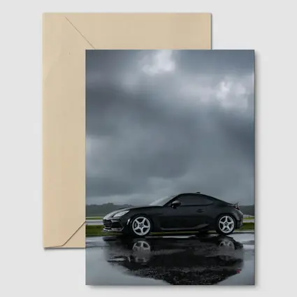 Subaru BRZ Black Wet Tarmac Stormy Sky