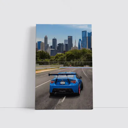 Blue Subaru BRZ on City Track
