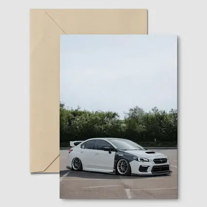Subaru WRX STI Slammed White Parking Lot