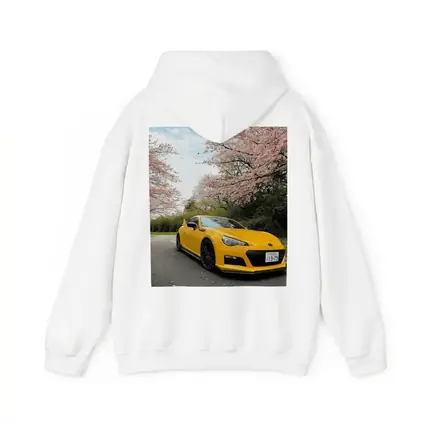 Yellow Subaru BRZ Under Cherry Blossoms