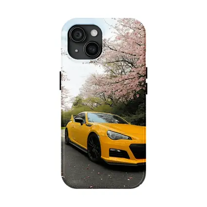 Yellow Subaru BRZ Under Cherry Blossoms