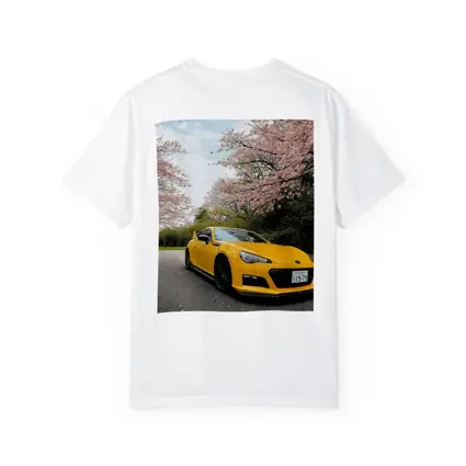Yellow Subaru BRZ Under Cherry Blossoms