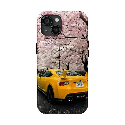 Yellow Subaru BRZ Under Cherry Blossoms