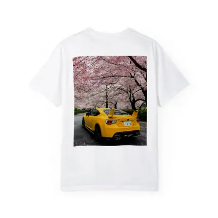 Yellow Subaru BRZ Under Cherry Blossoms