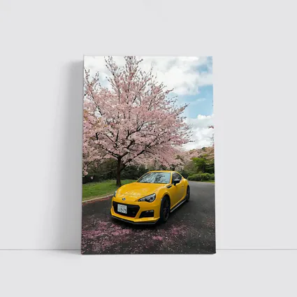 Subaru BRZ Yellow Under Cherry Blossoms