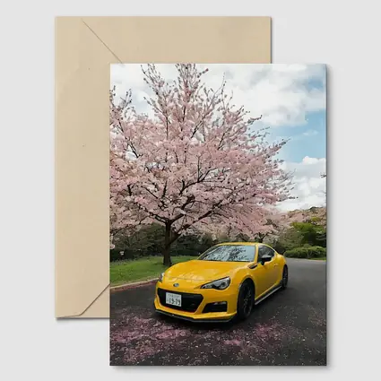 Subaru BRZ Yellow Under Cherry Blossoms