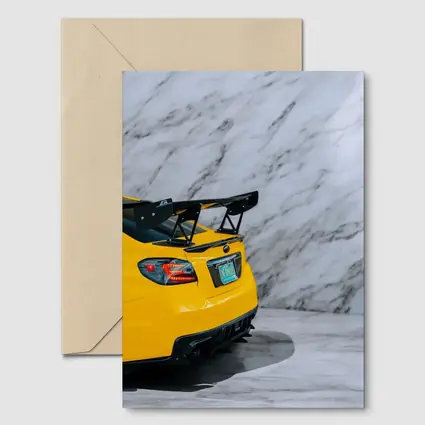 Subaru BRZ Yellow Rear Marble Background