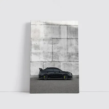Subaru WRX STI Black Against Concrete Wall