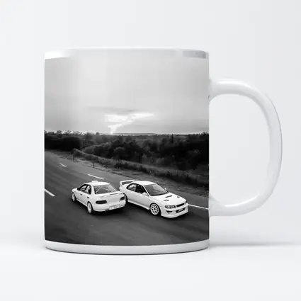 Two White Subaru Impreza WRX On Road